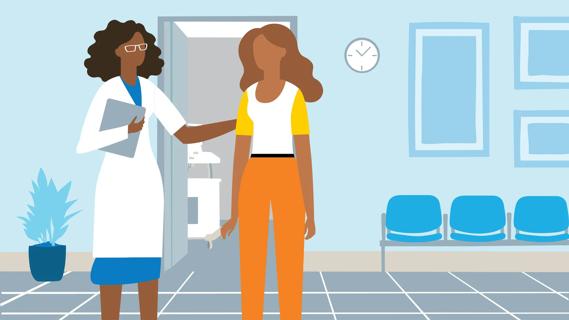 Healthcare provider talking to patient in waiting room lobby